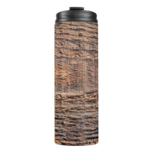Draperie-Textur von altem Holz. abstrakt, gealtert Thermosbecher