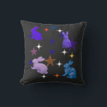 Dreamy Galaxy Bunnies Kissen<br><div class="desc">Step into a dream with this enchanting Celestial Bunny design. Featuring four textured,  painterly rabbits dancing among a constellation of hand-drawn and glowing stars,  this piece captures the magic of a midnight meadow. A perfect choice for rabbit lovers,  stargazers,  and anyone who appreciates an artistic,  whimsical aesthetic.</div>