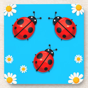 Drei farbenfrohe Ladybugs auf blauem Hintergrund Getränkeuntersetzer