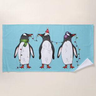 Drei festliche Weihnachtspinguine Illustration Strandtuch