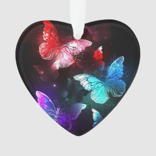 Drei glühende Schmetterlinge im Hintergrund Ornament