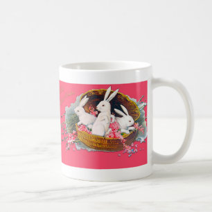 Drei Häschen in einer Korb-Tasse Kaffeetasse