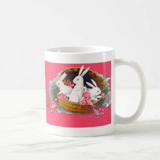 Drei Häschen in einer Korb-Tasse Kaffeetasse