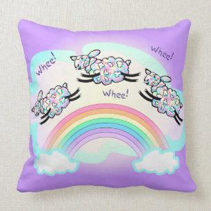 Drei-Rad-Schafe springen über einen Regenbogen Süß Kissen