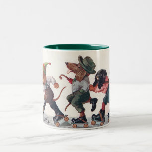 Drei Schlittschuh laufende Dachshunde - Ein anthro Zweifarbige Tasse