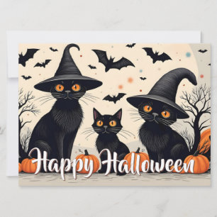 Drei schwarze Katzen mit Hüten an Halloween