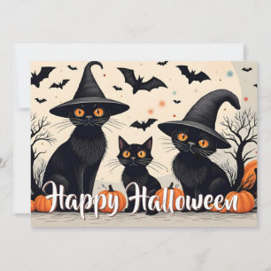 Drei schwarze Katzen mit Hüten an Halloween