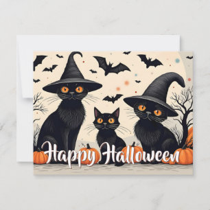 Drei schwarze Katzen zu Halloween