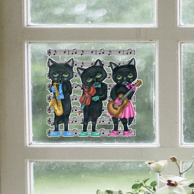 Drei schwarze Musikinstrumente Noten Fensteraufkleber (three black cats playing musical instruments in colourful shoes on sheet music on window cling.)