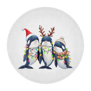 Drei Wale mit Weihnachtsfeiertag-Weihnachtsmannmüt Schneidebrett