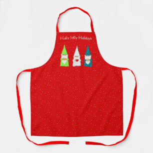 Drei Weihnachts-Gnome auf roter Schürze