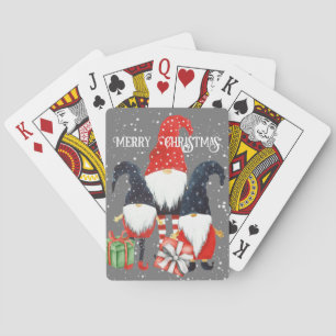 Drei Weihnachtselfen mit Kartenpaketen Spielkarten