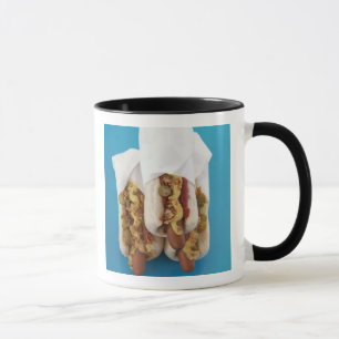 Drei Würstchen in den Brötchen Tasse