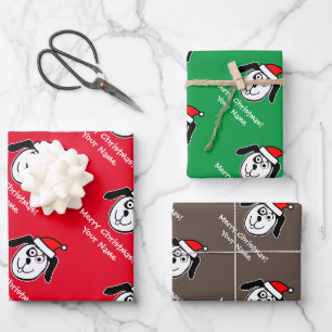 Drôle Père Noël chien feuilles de papier d'emballa