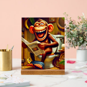 Drôle singe caricature sur Toilet