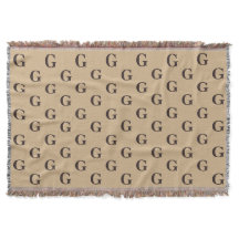 Dunkelbraune Monogramm Muster Tan Hintergrund