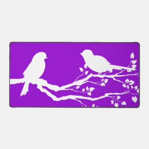Dunkle Violett-Landvögel bei Erholung Schreibtischunterlage