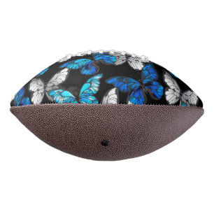Dunkles Nahtloses Muster mit blauen Schmetterlinge Football