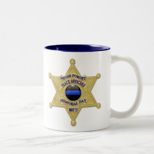 Dünne blaue Linie - glühende Schaltfläche und Gold Zweifarbige Tasse