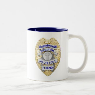 Dünne blaue Linie - glühende Schaltfläche und Gold Zweifarbige Tasse