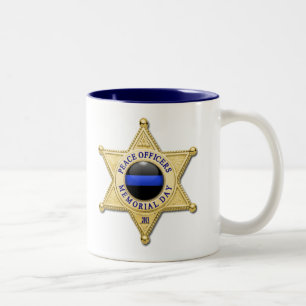 Dünne blaue Linie - glühende Schaltfläche und Gold Zweifarbige Tasse