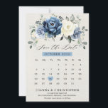 Dusty Blue Navy Champagne Elfenbeinblume Kalender  Save The Date<br><div class="desc">Der blühende Hochzeitskalender Save the Date mit seinem eleganten Bouquet aus Marineblau,  Königblau ,  Weiß ,  Gold,  Champagnerelfenbein,  Rose in Rosa,  Blume-Ranunculus und Salbei-Grün Eukalyptus-Blätter und elegantem Aquarellbogen. Bitte kontaktieren Sie mich für Hilfe bei der Anpassung oder wenn Sie ein anderes Produkt mit diesem Design benötigen.</div>
