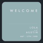 Dusty Boho | Blue Wedding Welcome Square Sticker<br><div class="desc">Dieser Dusty Boho | Blaue Hochzeitsnacht-Aufkleber ist perfekt für Ihre bunten rustikale Hochzeit. Das einfache, einzigartige moderne Design, begleitet von einem zeitgenössischen minimalistischen Drehbuch und einer staubblauen Farbpalette, verleiht diesem Produkt ein klassisches böhmisches Ambiente. Behalt es so, wie es ist, oder wähle es aus, um es mit Kunstwerken oder Grafiken...</div>
