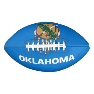 Dynamic Oklahoma State Flag Graphic on a Football