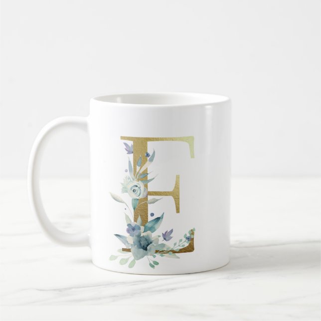 E Golden initial mit blauem Blumenblättern Kaffeetasse (Links)