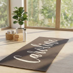 Earthy Brown Minimalist Calligraphy Personalized Yogamatte<br><div class="desc">This personalized yoga mat features a soft earthy brown background with elegant cream script lettering for a calm, modern look. Designed to add a personal touch to yoga sessions, home workouts, and studio classes while staying timeless and minimal. The clean script style feels relaxed and refined, making it a favorite...</div>