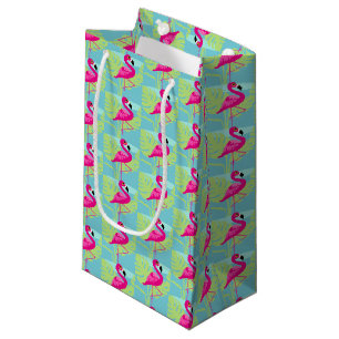Eau flamand rose et sacs cadeaux motifs de palme