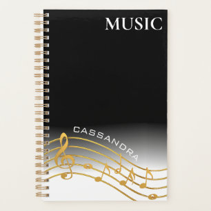 Échelle de note de musique noire et d'or