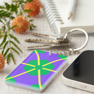 Éclatement géométrique en violet, vert et jaune