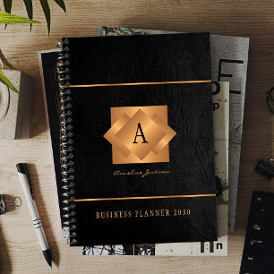 Écriture de nom d'or noir monogramme moderne
