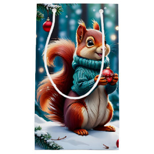Écureuil rouge mignon en sac cadeau de Noël