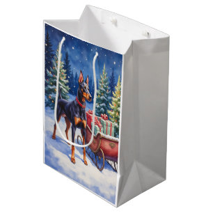 Edler Dobermann bewacht Weihnachtsschlitten Winter Mittlere Geschenktüte