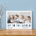 Eier für die Welt | 2 Foto Hanukkah Feiertagskarte<br><div class="desc">Whimsical Hanukkah Foto-Karte verfügt über zwei Ihrer Lieblings-Fotos in einem quadratischen Format nebeneinander ausgerichtet. "Oy to the World" erscheint unterhalb in blauen, ausgeschnittenen Buchstaben. Personalisieren Sie Ihren Familiennamen oder Namen, Ihre persönliche Begrüßung und das Jahr am unteren Ende. Eine lustige und moderne Hanukkah-Karte, die Ihren Urlaubsmailings eine leichte Freude bereiten...</div>