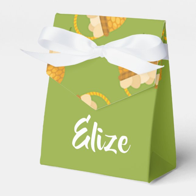 Eier in braunem Korb auf grün Geschenkschachtel (Vorderseite)