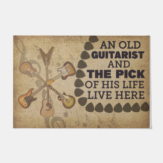 Ein altes Gitarrist-Rug, ein stimmungsvoller Gitar Fußmatte