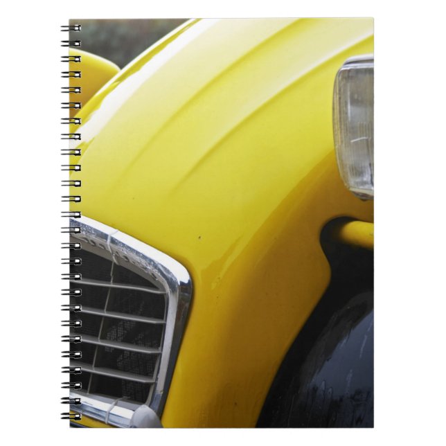 Ein altes schwarz-gelbes Citroen 2CV 2 CV, Detail Notizblock (Vorderseite)