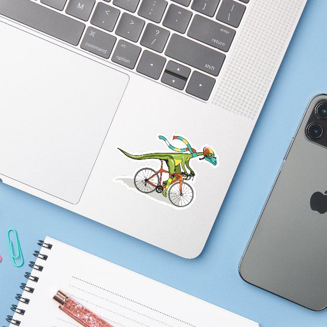 Ein Anabisetia Dinosaurier, der mit dem Fahrrad fä Aufkleber (Laptop mit iPhone)