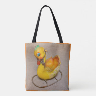 ein antikes Schaukeln für Kinder auf der Totttasch Tasche