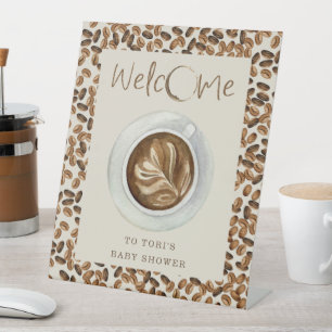 Ein Baby brütet Kaffeebohnen Babydusche Begrüßung Sockelschild