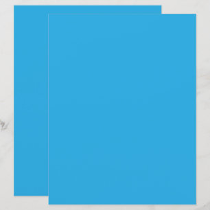 ein blauer Hintergrund mit einer schwarz-weißen Ka