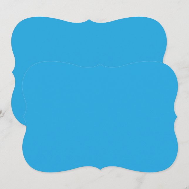 ein blauer Hintergrund mit einer schwarz-weißen Ka Mitteilungskarte (Vorne/Hinten)