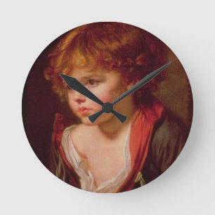 Ein blonder behaarter Junge mit einem offenen Runde Wanduhr