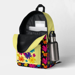 Ein Blumenbeet mit blühenden Blume Bedruckter Rucksack