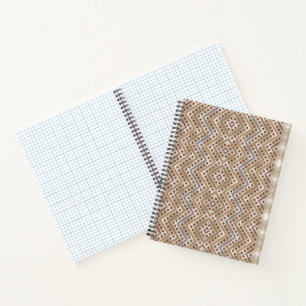 Ein brauner Teppich mit symmetrischem Design Notizbuch
