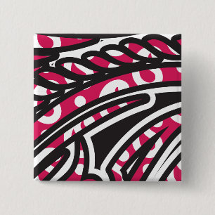 Ein dekoratives Paisley-Design mit lebendigem Rot  Button