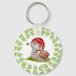 Ein farbenfroher Wald fliegt und eine Schnecke Schlüsselanhänger